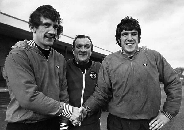 Liverpool manager Bob Paisley with Terry McDermott and Emlyn Hughes