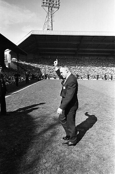 Liverpool manager Bill Shankly ackgnowledges the cheers of the crowd as they celebrate