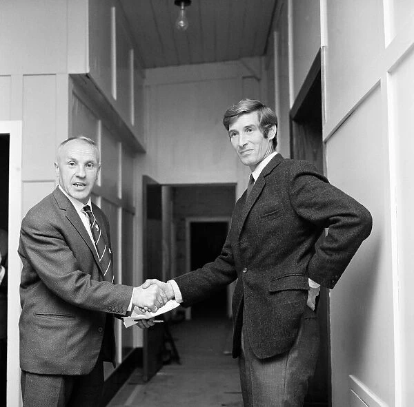 Liverpool manager Bill Shankly bids farewell to Geoff Strong at Anfield as he signs for