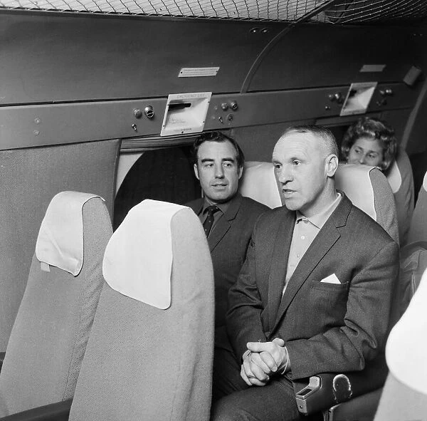 Liverpool manager Bill Shankly on board a plane en route to Lisbon