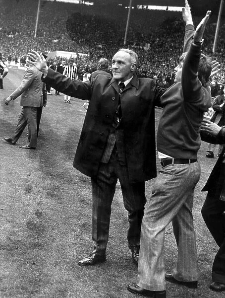 Liverpool manager Bill Shankly celebrates on the picth at Wembley following his side