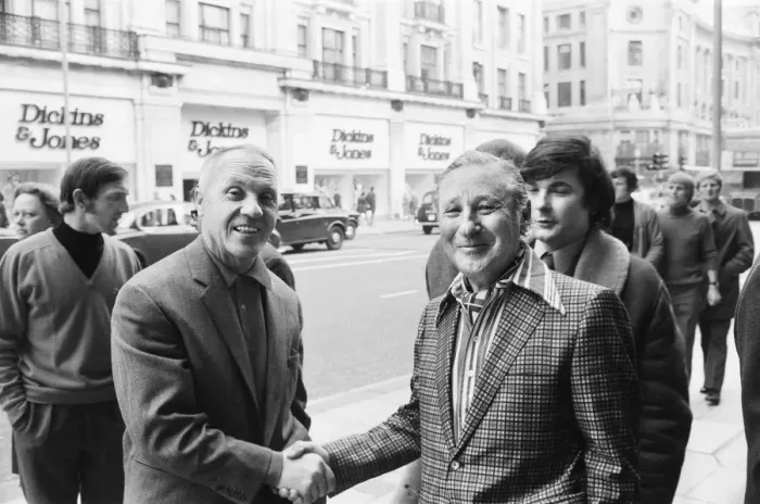 Framed Print : Liverpool manager Bill Shankly greets Recording company executive Abe Goff in Regent