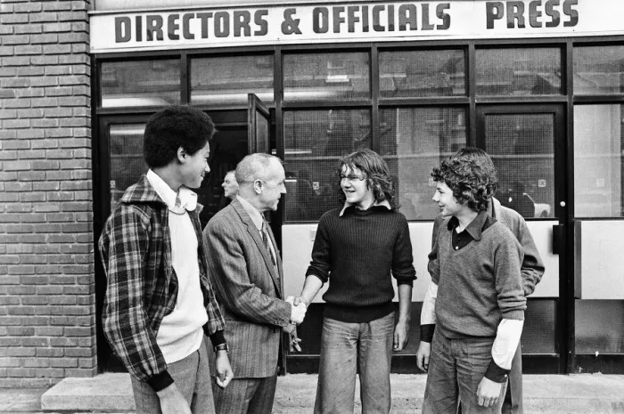 Framed Print : Liverpool manager Bill Shankly greets young fans outside the director