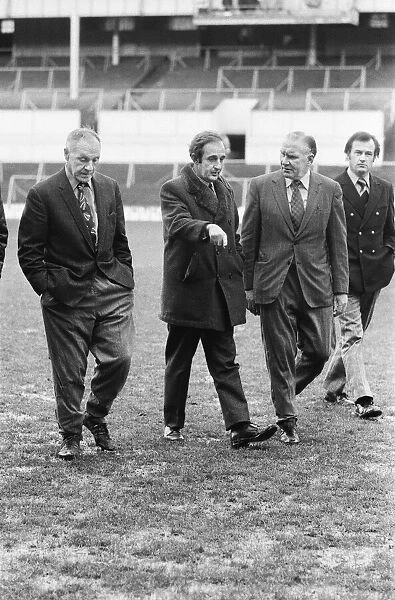 Liverpool manager Bill Shankly inspecting the pitch before the match against Tottenham