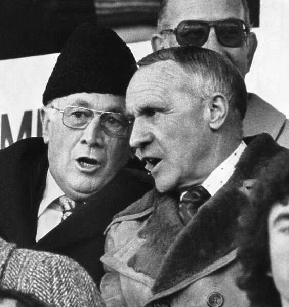 Former Liverpool manager Bill Shankly with Joe Mercer in the stands watching a match