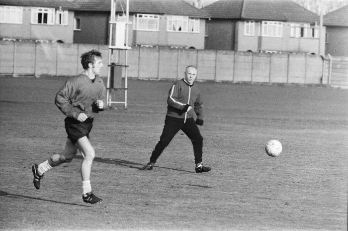 Framed Print : Liverpool manager Bill Shankly keeps a close eye on Liverpool forward Peter Thompson as Framed Print : Liverpool manager Bill Shankly keeps a close eye on Liverpool forward Peter Thompson as