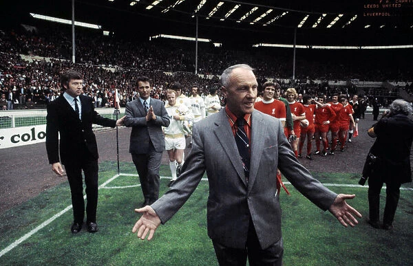 Liverpool manager Bill Shankly leads out his team on to the pitch at Wembley Stadium for
