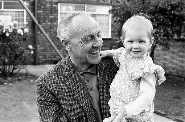 Former Liverpool manager Bill Shankly pictured relaxing at home with family following his