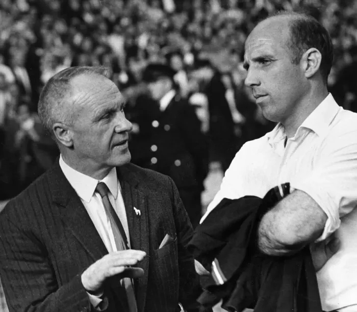 Framed Print : Liverpool manager Bill Shankly and Ronnie Moran in reflective mood after defeat to Framed Print : Liverpool manager Bill Shankly and Ronnie Moran in reflective mood after defeat to