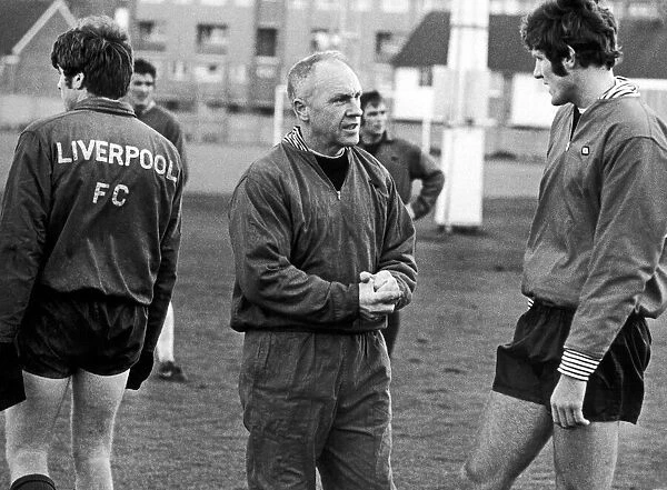 Liverpool manager Bill Shankly speaking with John Toshack during a training session at