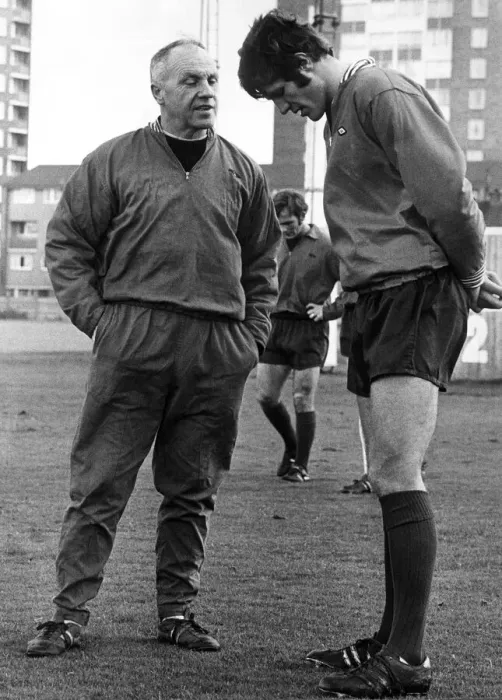 Framed Print : Liverpool manager Bill Shankly talking with John Toshack during a team training session Framed Print : Liverpool manager Bill Shankly talking with John Toshack during a team training session
