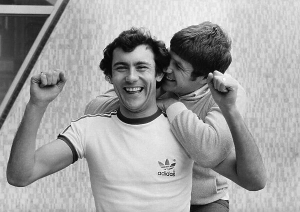 Liverpool pair Ray Kennedy and Emlyn Hughes. Circa February 1977