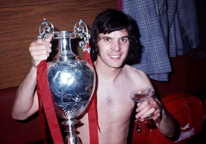 Framed Print : Liverpool player Peter Cormack celebrates winning the League Championship with the trophy