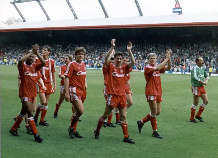 Framed Print : Liverpool players acknowledge their fans and celebrate winning the League Championship