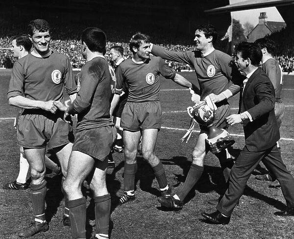 Liverpool players celebrate their title win following the 2-1 victory over Chelsea at