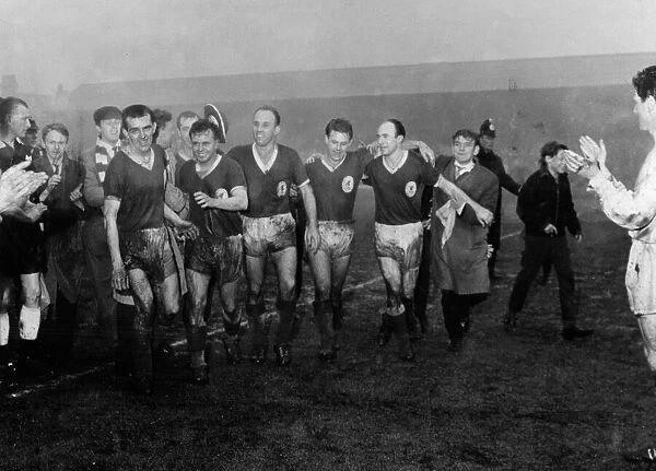Liverpool players leave the field after beating Southampton to win the 2nd Division title