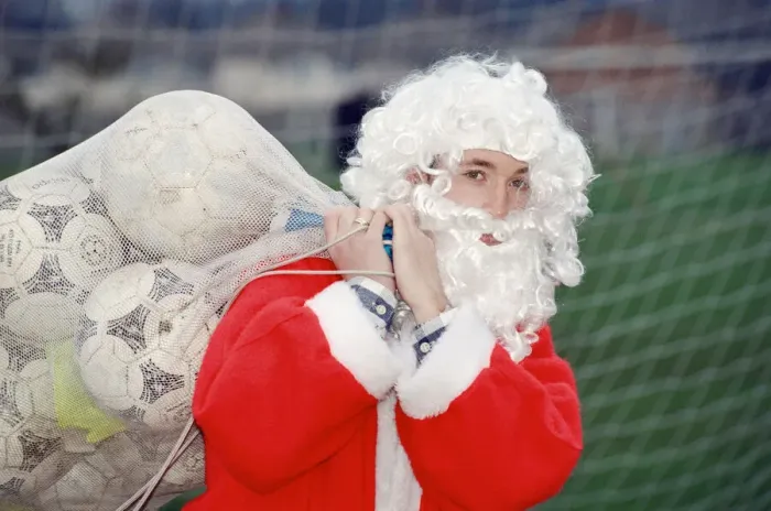 Framed Print : Liverpool striker Robbie Fowler dressed as Farther Christmas. 19th December 1995