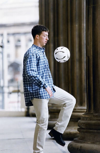Liverpool striker Robbie Fowler showing off his ball skills at St Georges Hall