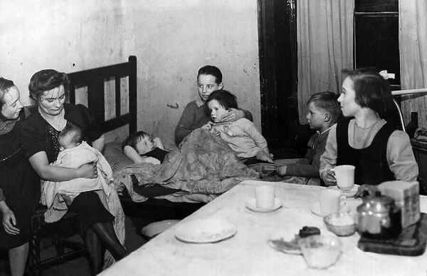 Liverpool Terrace Slum A mother and her family seen here living in one room of a