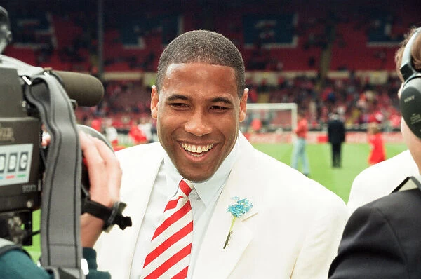 Liverpools John Barnes on the pitch at Wembley being interviewd by the BBC before