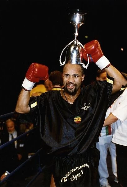 LLoyd Honeyghan Boxing With commonweath championship cup on head