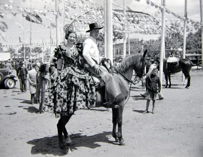 Framed Print : Local couple of Seville, Spain on horseback Circa 1935