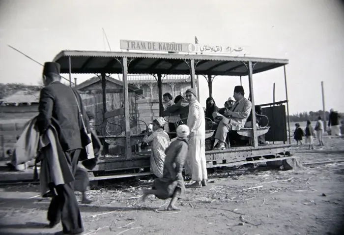 Framed Print : Local people of Kabouti in Egypt using the public trams Circa 1935 People