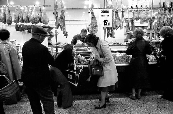 Local people queuing for meat at 'Boucherie Bernard'the largest butcher