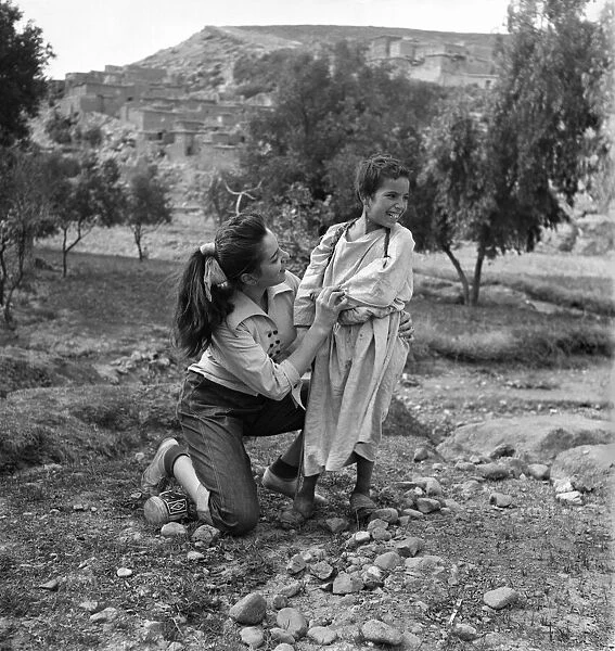 Local woman and child in the countryside of Morooco December 1952 C5919-023