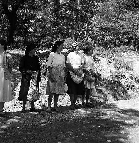 Local women watching in Santarem awaiting the arrival of Princess Margaret. 9th June 1959