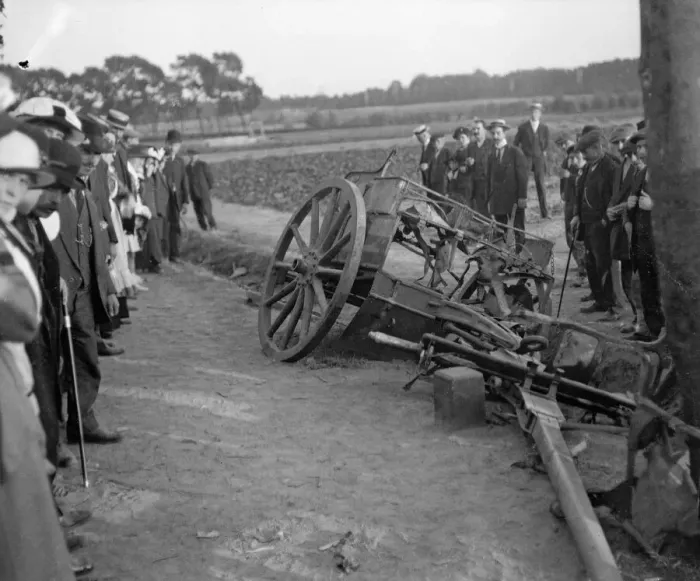 Framed Print : Locals examine a damaged and abandoned gun limber in the remains of the Belgium village Framed Print : Locals examine a damaged and abandoned gun limber in the remains of the Belgium village