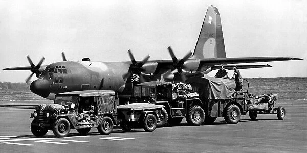 A Lockheed C-130 Hercules arrives at Newcastle Airport carrying American artillerymen for