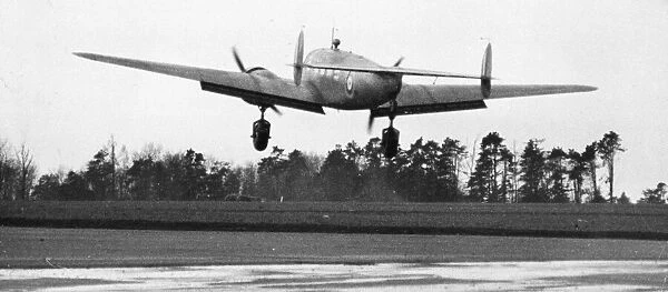 A US Lockheed Hudson plane, lands at an aerodrome somewhere in England
