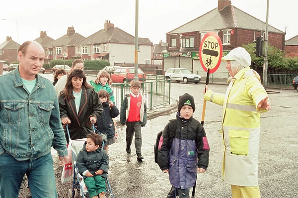 Lollipop lady Janet Taylor on duty at the junction of Trunk Road with Kings Road