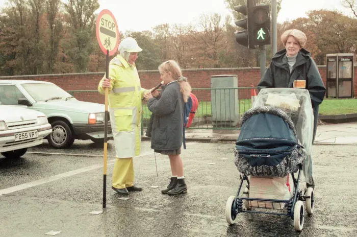 Framed Print : Lollipop lady Janet Taylor on duty at the junction of Trunk Road with Kings Road