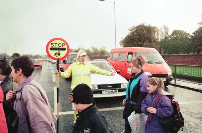 Framed Print : Lollipop lady Janet Taylor on duty at the junction of Trunk Road with Kings Road Framed Print : Lollipop lady Janet Taylor on duty at the junction of Trunk Road with Kings Road