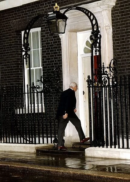 London 10 Downing Street with rear view of Denis Thatcher