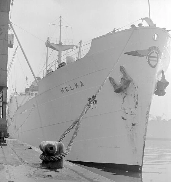 London Docks in the mid fifties when the docks were in full flow showing cargo ship Helka