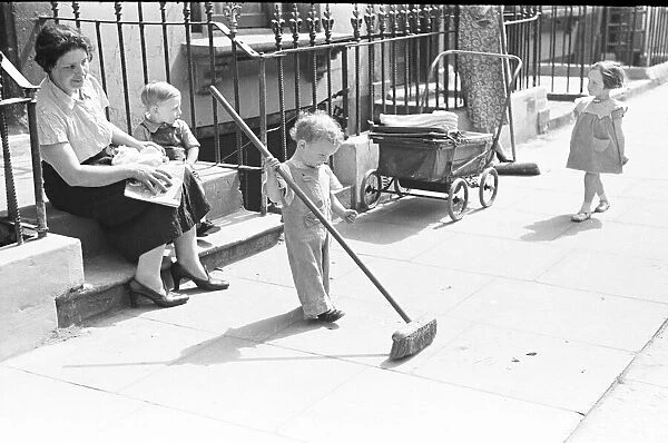 London Kids, children seen here playing in the street during the spring of 1941 Circa May