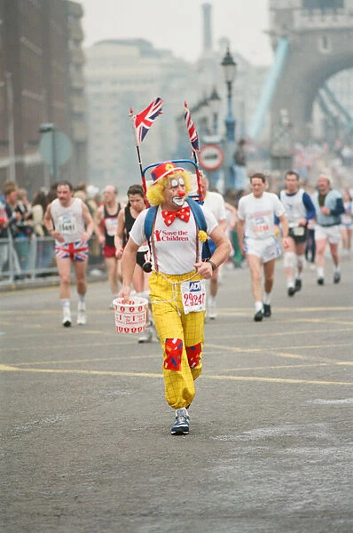 The London Marathon - 1990 Runners pass through and around the Tower Bridge area