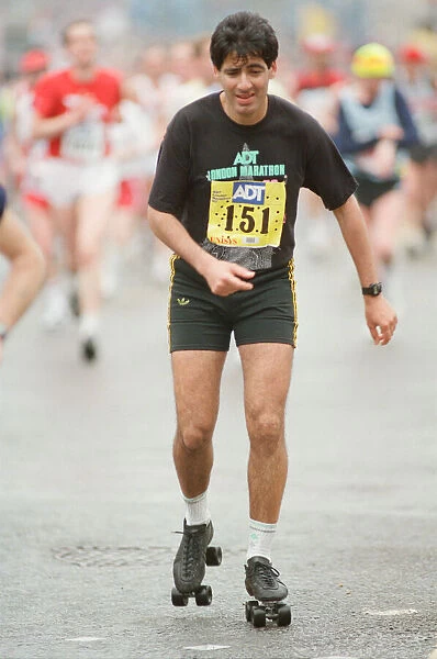 The London Marathon - 1990 Runners pass through and around the Tower Bridge area