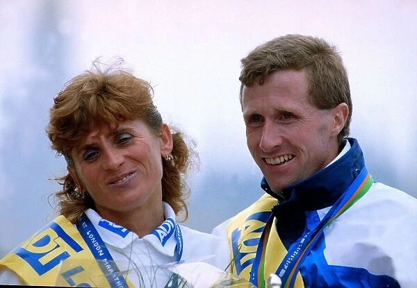 London Marathon Winners Alister Hutton and Wanda Panfil receiving their medals
