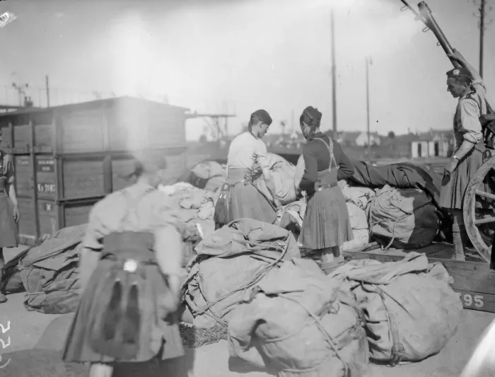 Framed Print : London Scottish Territorials seen here unloading a supply train at Orleans, France Framed Print : London Scottish Territorials seen here unloading a supply train at Orleans, France
