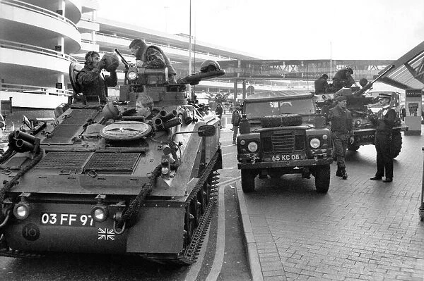 London. Soldiers and armoured vehicles moved into Heathrow yesterday to guard against