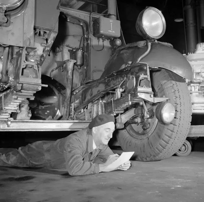 Framed Print : London Transport mechanics seen here checking the engine of a Leyland bus