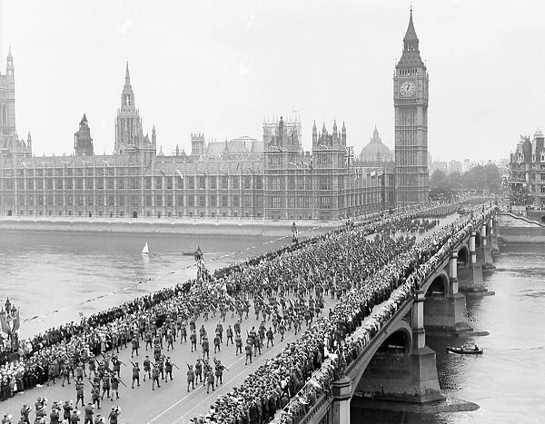 London victory march. Passing over Westminster Bridge with the Houses of Parliament in