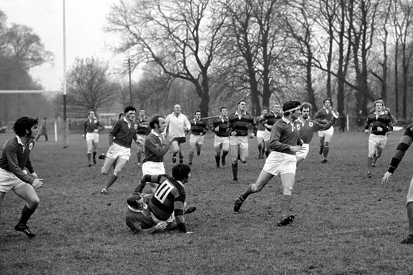 London Welsh v. Aberavon. T. G. Evans of London Welsh is blocked but gets the ball