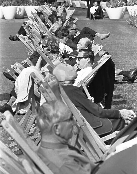 Londoners enjoying the summer sunshine in Embankment Gardens. 3rd June 1968