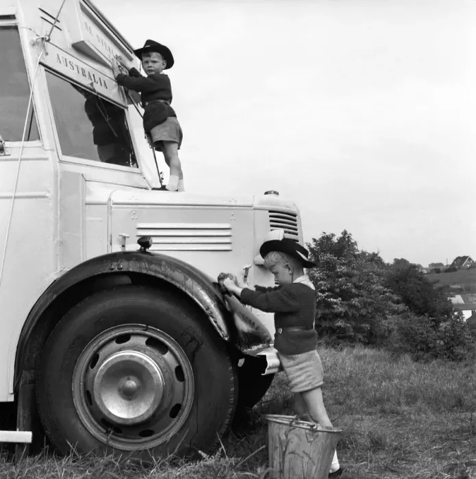 Framed Print : Long distance bus journey. The Drew family seen here with their converted bus in which