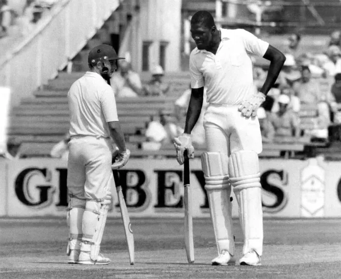 Framed Print : The long and short of it. Joel Garner and Gard hold mid wicket conference. P006189. c Framed Print : The long and short of it. Joel Garner and Gard hold mid wicket conference. P006189. c